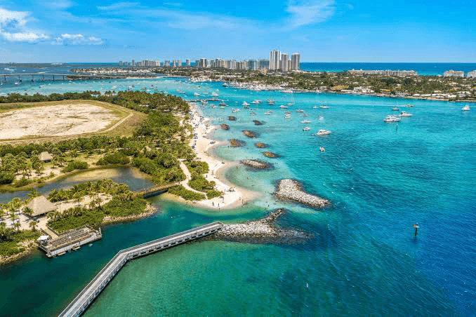 Aerial view of Peanut Island and turquoise water with boats anchored near West Palm Beach